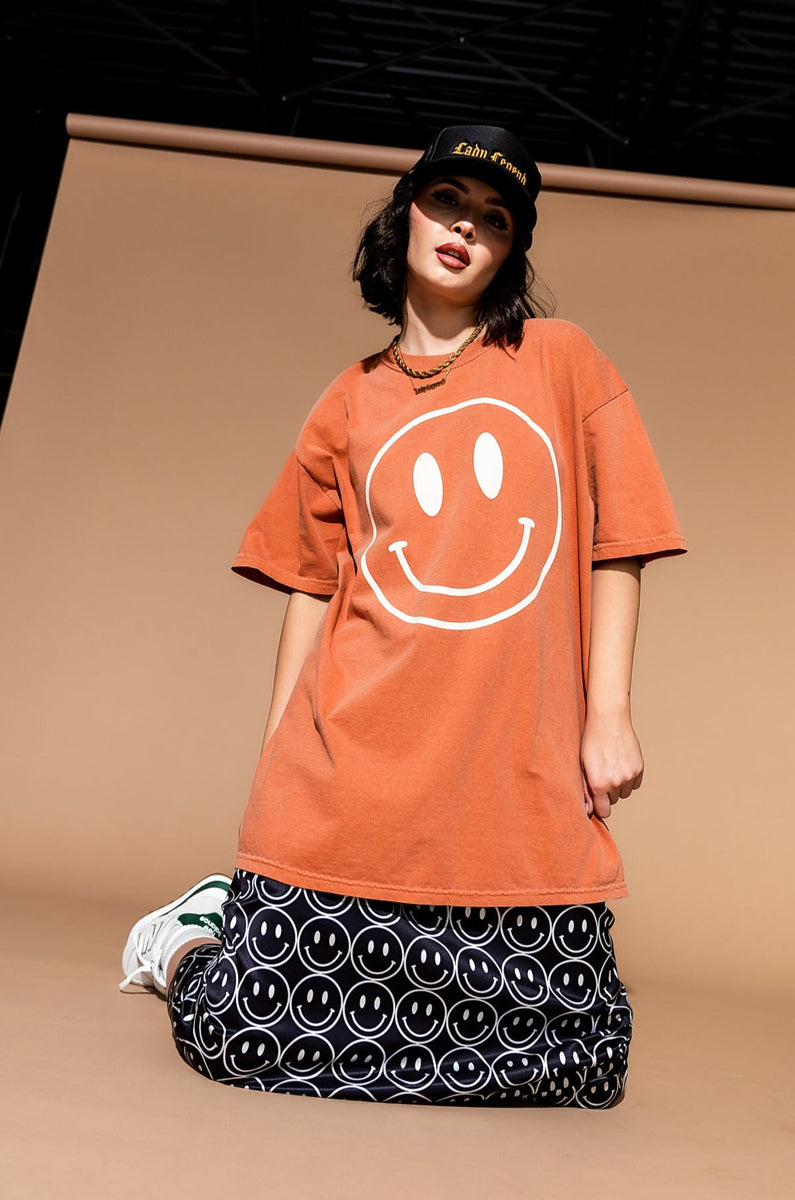 The World Needs Your Magic Oversized Tee in Sunset Dressed in Lala