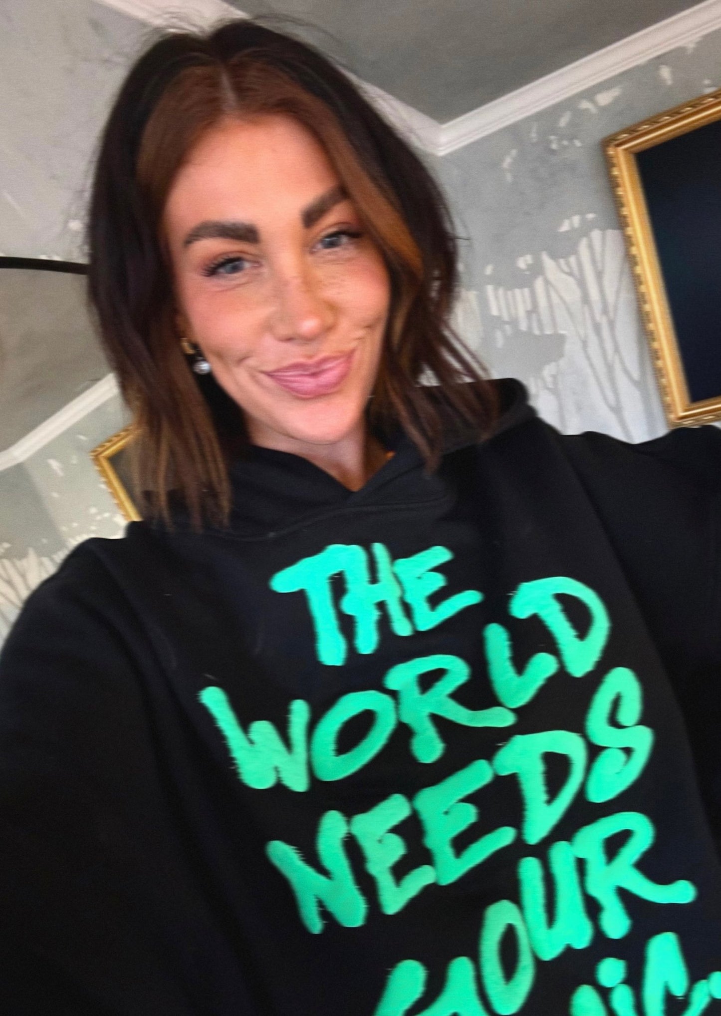 LALA ORIGINAL: Energy Doesn’t Lie Cropped Hoodie in The World Needs Your Magic Puff Print - Dressed in Lala