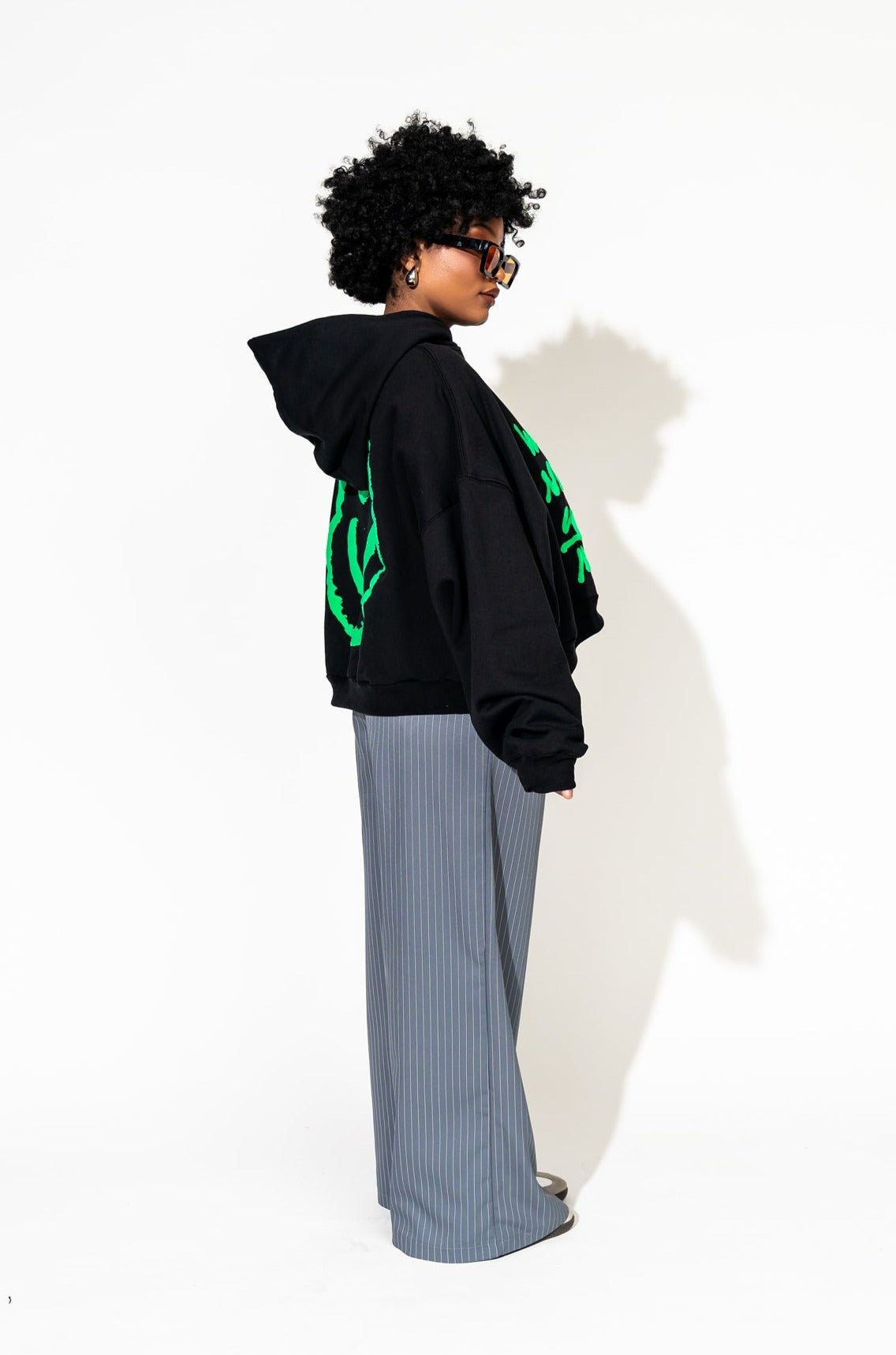 LALA ORIGINAL: Energy Doesn’t Lie Cropped Hoodie in The World Needs Your Magic Puff Print - Dressed in Lala