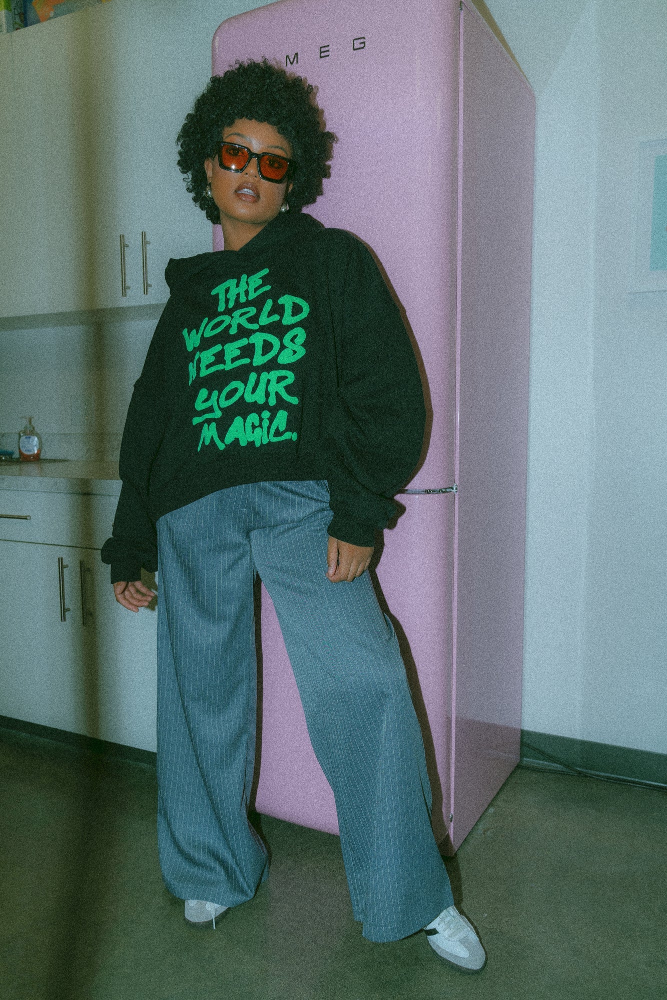 LALA ORIGINAL: Energy Doesn’t Lie Cropped Hoodie in The World Needs Your Magic Puff Print - Dressed in Lala