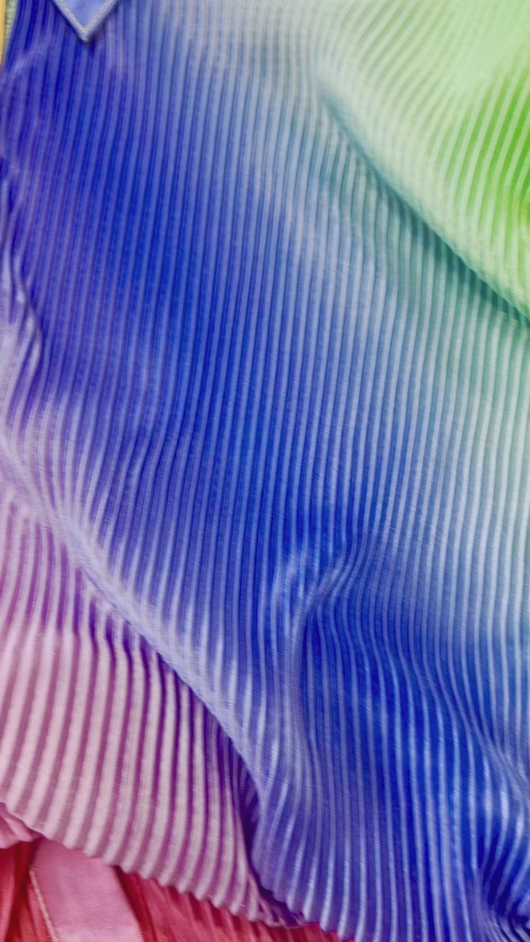 DRESSED IN LALA SO FAR SO GOOD OVERSIZED PLISSE DRESS IN PRISMATIC RAINBOW VIDEO