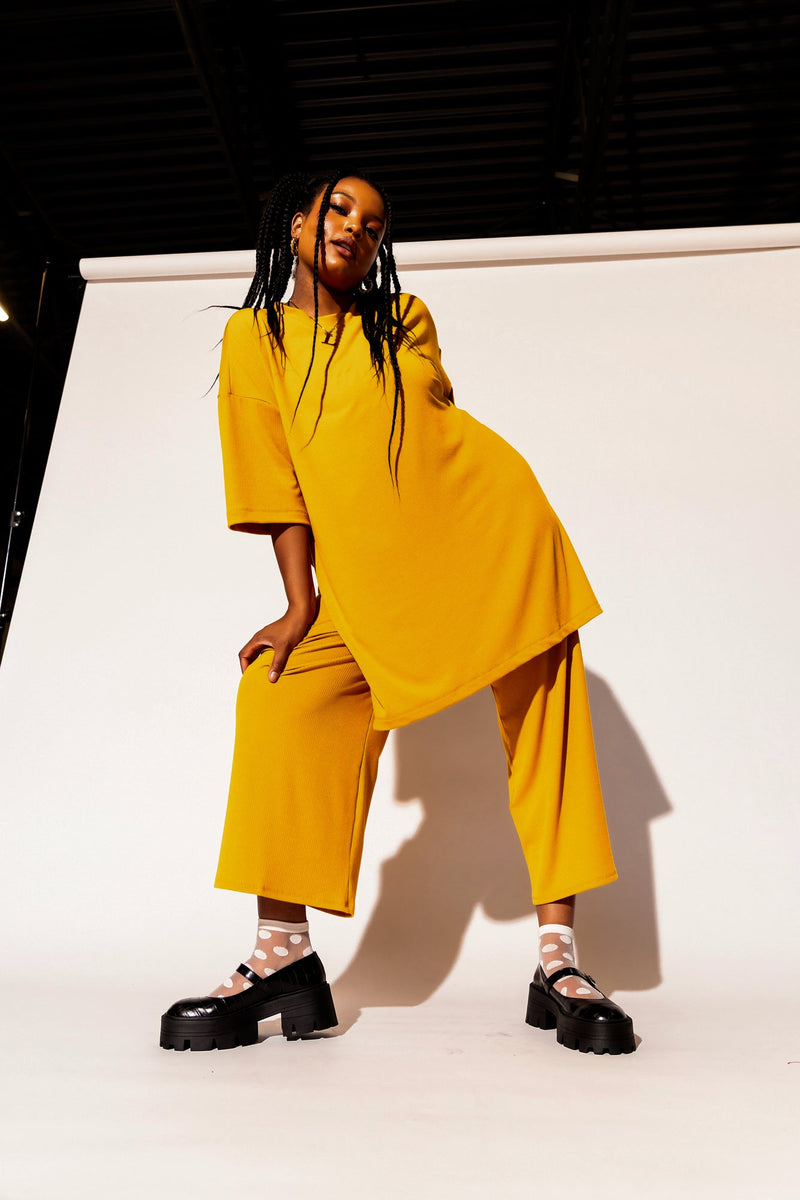 Lex Ribbed Playsuit in Golden Yellow Dressed in Lala