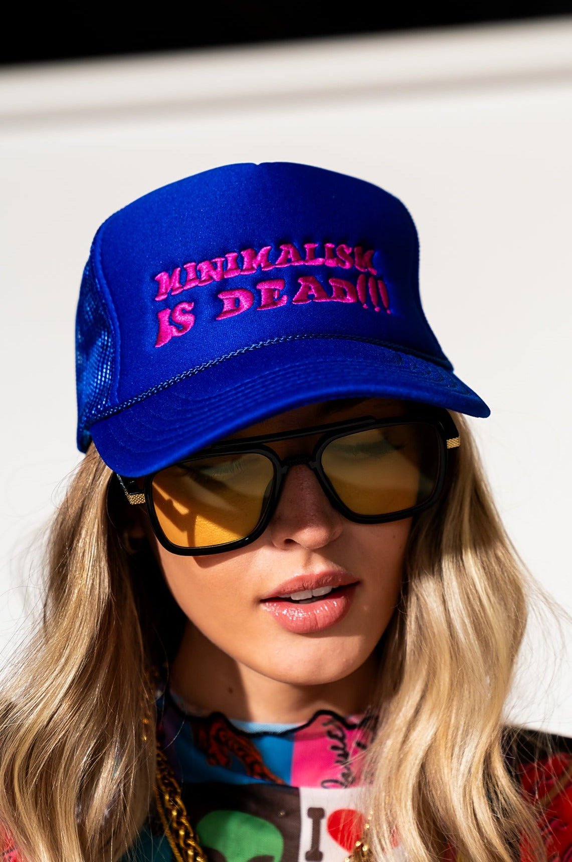 LALA ORIGINAL: Minimalism Is Dead Embroidered Trucker Hat - Dressed in Lala