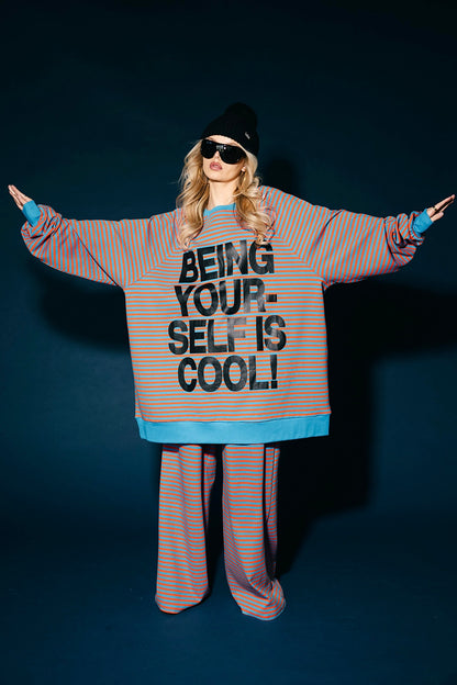 Being Yourself Is Cool Ultra Mega Striped Oversized Pullover in Blue + Orange