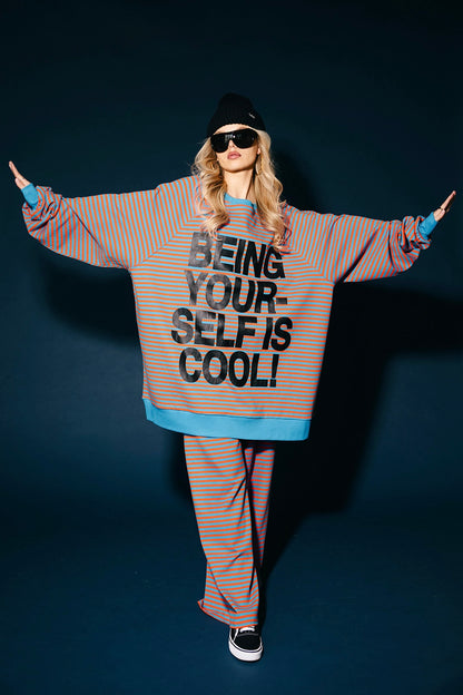 Being Yourself Is Cool Ultra Mega Striped Oversized Pullover in Blue + Orange
