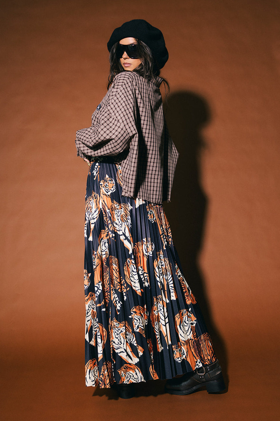 Untamable Pleated Midi Skirt in Black Tiger Tales