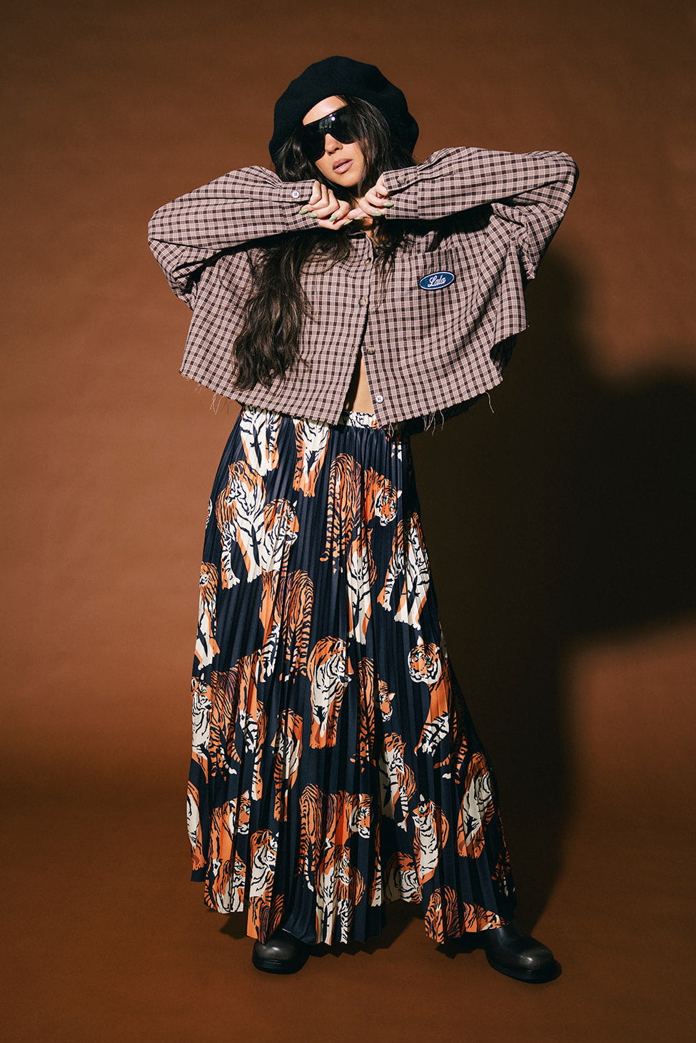 Untamable Pleated Midi Skirt in Black Tiger Tales