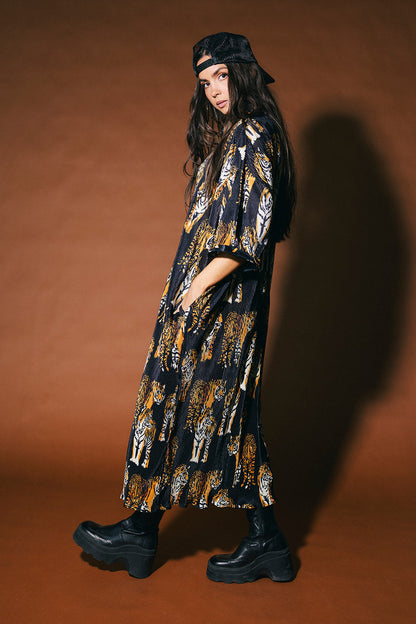 So Far So Good Oversized Plissé Dress in Black Tiger Tales