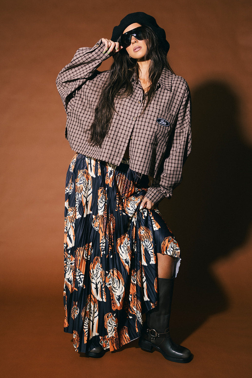 Untamable Pleated Midi Skirt in Black Tiger Tales