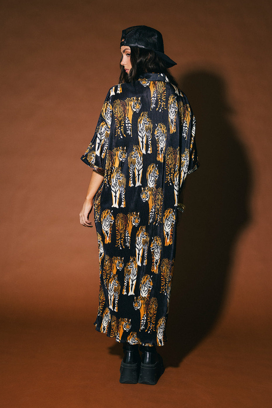 So Far So Good Oversized Plissé Dress in Black Tiger Tales
