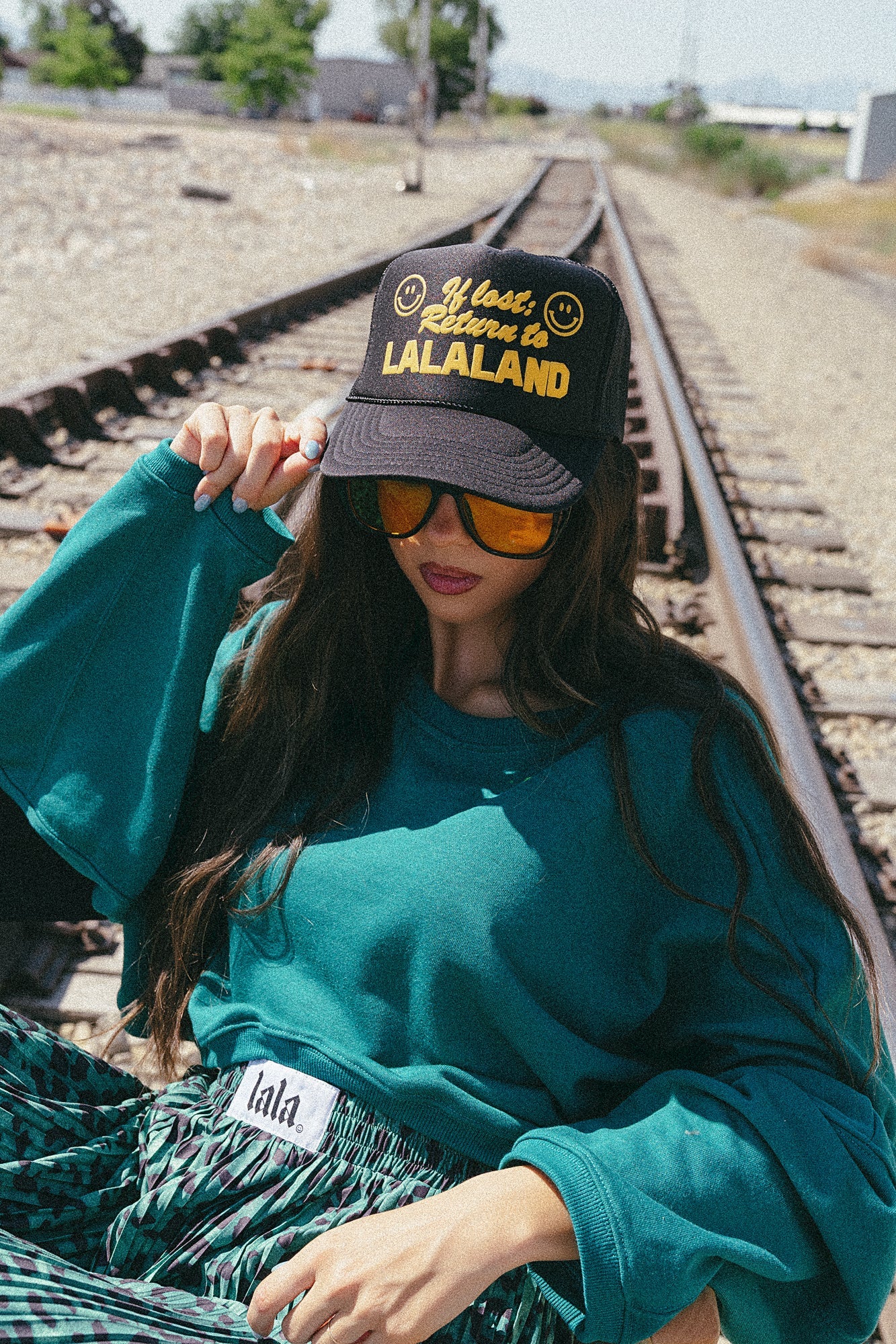 If Lost, Return to Lalaland Puff Print Trucker Hat - Dressed in Lala