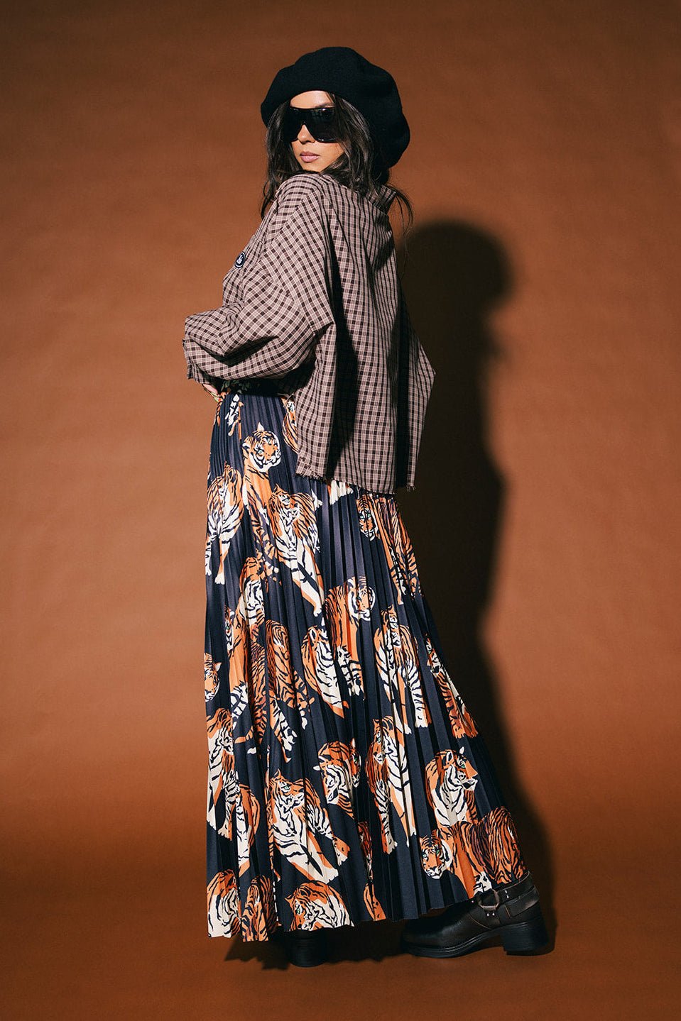 Untamable Pleated Midi Skirt in Black Tiger Tales - Dressed in Lala