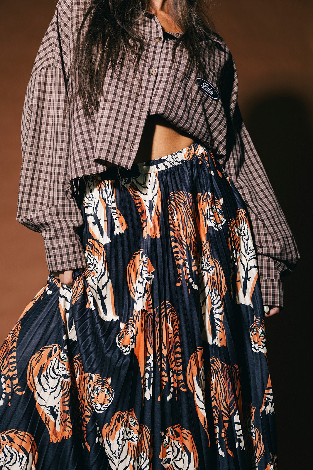 Untamable Pleated Midi Skirt in Black Tiger Tales - Dressed in Lala