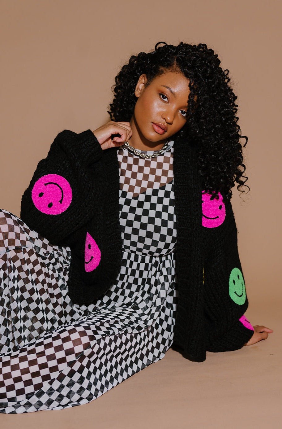 Visionary Hand Knit Smiley Cardigan Dressed in Lala