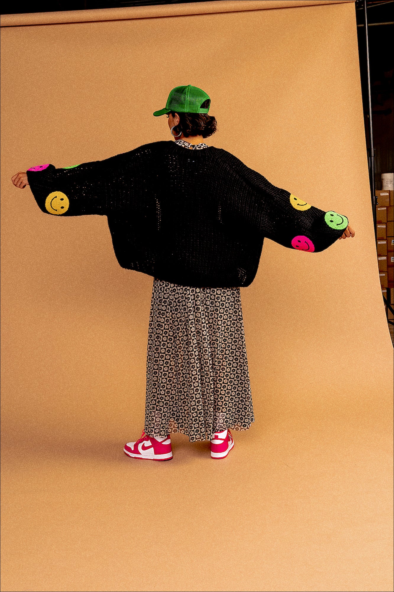 Visionary Hand Knit Smiley Cardigan Dressed in Lala