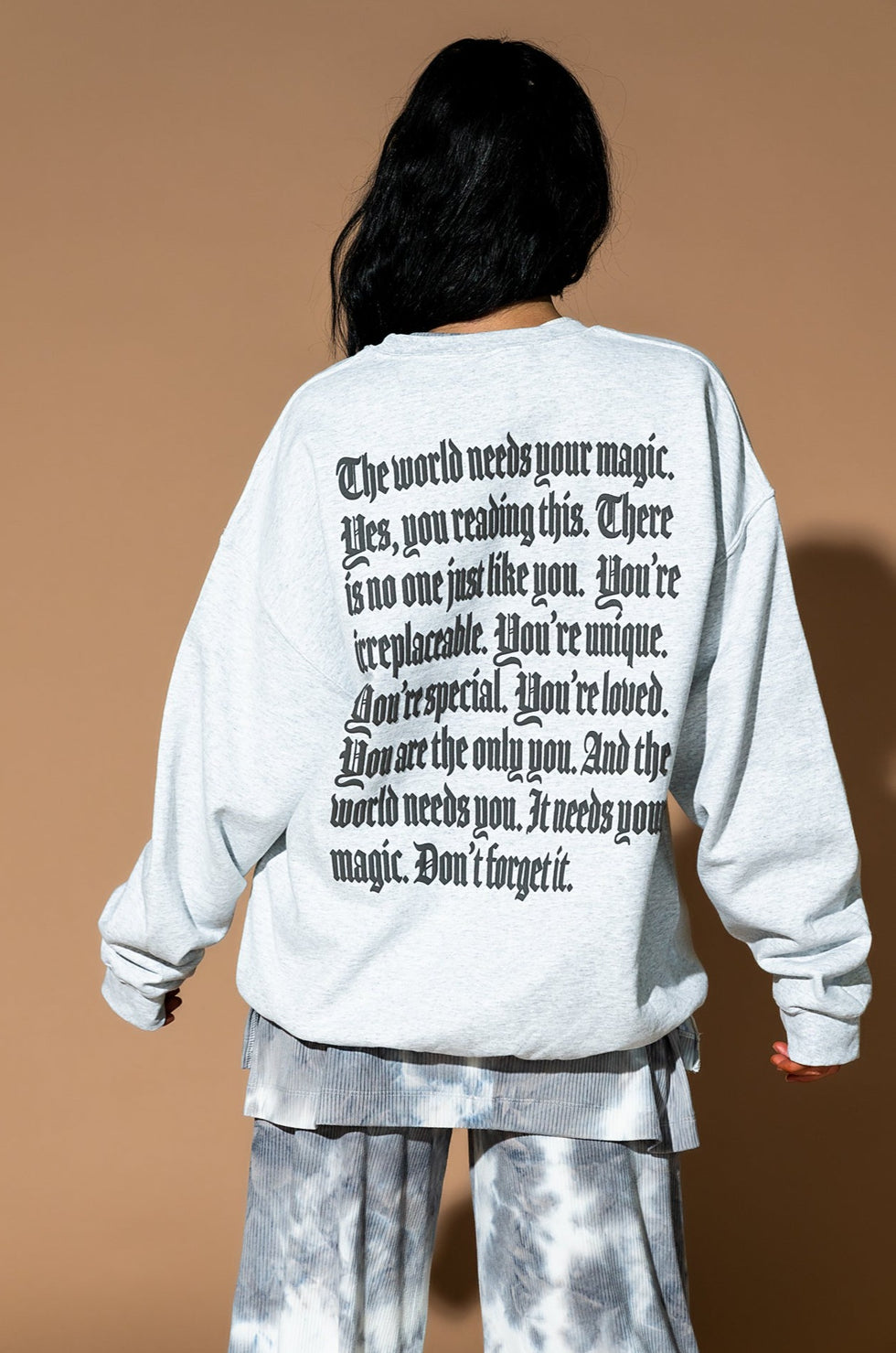 The World Needs Your Magic Mantra Oversized Puff Print Pullover in Vin
