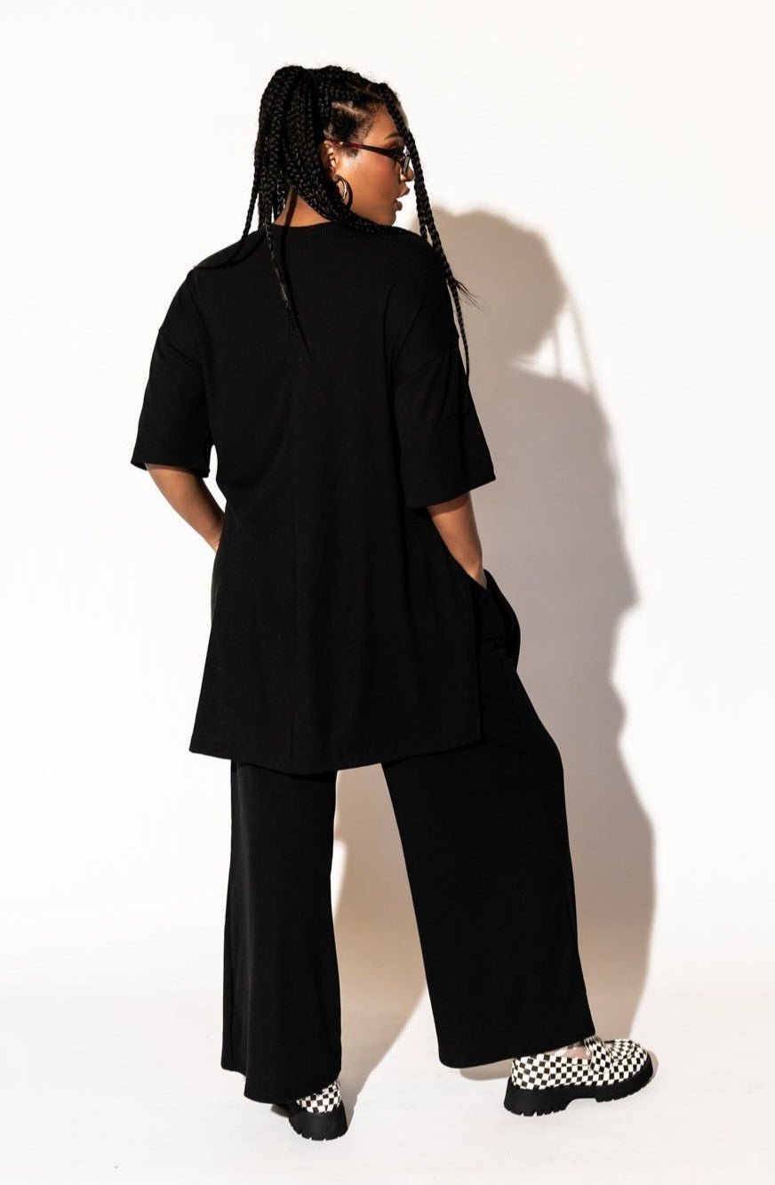 LALA ORIGINAL: Leveled Up Ribbed Playsuit in Black - Dressed in Lala