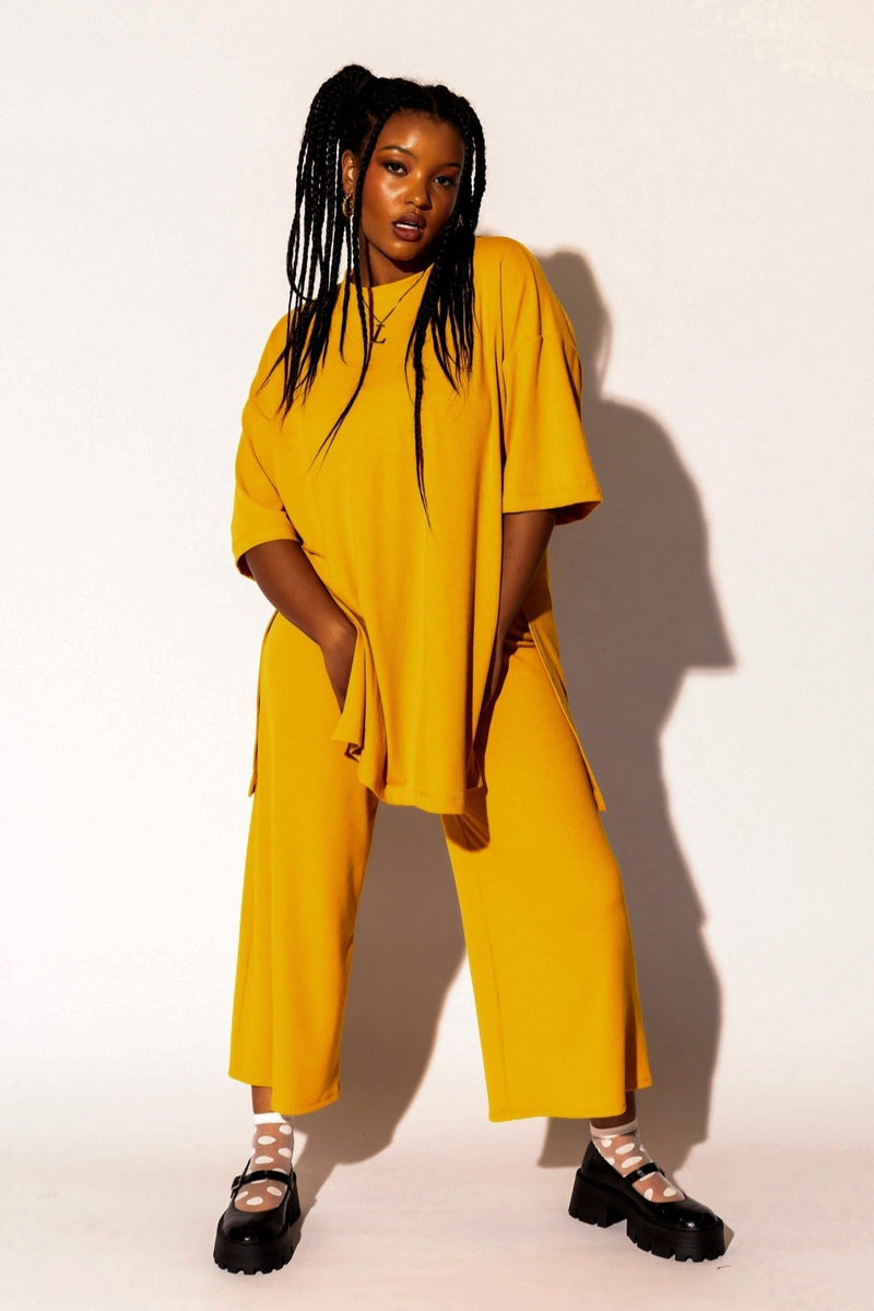 Lex Ribbed Playsuit in Golden Yellow Dressed in Lala