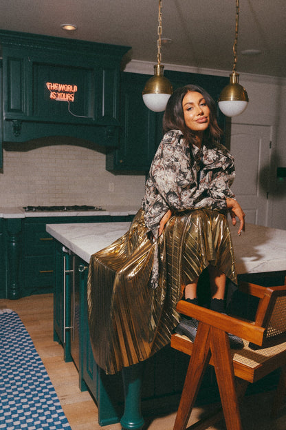 LALA ORIGINAL: Metallic Pleated Midi Skirt in 24 Karat Gold *SHIPPING STARTS 11/2/23* - Dressed in Lala